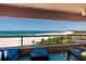 Enjoy panoramic ocean views from this balcony, complete with comfortable seating and stylish decor at 1310 Gulf Blvd # 6C, Clearwater Beach, FL 33767