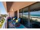 Relax on this balcony with comfortable seating, offering stunning views of the beach and ocean at 1310 Gulf Blvd # 6C, Clearwater Beach, FL 33767