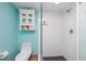 Modern bathroom with tiled shower, vanity, and storage cabinet at 1310 Gulf Blvd # 6C, Clearwater Beach, FL 33767