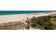 Breathtaking beach view from condo complex featuring white sand and clear ocean waters at 1310 Gulf Blvd # 6C, Clearwater Beach, FL 33767
