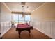 Bright billiard room featuring a beautiful ocean view and classic billiard table with traditional accents at 1310 Gulf Blvd # 6C, Clearwater Beach, FL 33767