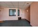 Cozy condo hallway with textured walls, a decorative mat, and a glimpse of the ocean view at 1310 Gulf Blvd # 6C, Clearwater Beach, FL 33767