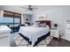 Bright bedroom with ocean view, stylish decor, woven headboard, and comfy king-size bed at 1310 Gulf Blvd # 6C, Clearwater Beach, FL 33767