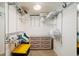 Organized walk-in closet with adjustable shelving and ample storage space at 1310 Gulf Blvd # 6C, Clearwater Beach, FL 33767