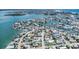 Stunning aerial view of waterfront homes with boat docks on a scenic canal, perfect for boating enthusiasts at 13124 4Th E St, Madeira Beach, FL 33708