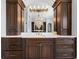 Close up of the bathroom vanity with cabinets, drawers, sink, and countertops at 16365 Redington Dr, Redington Beach, FL 33708