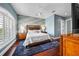 Cozy primary bedroom with a ceiling fan, windows and nice decor at 16365 Redington Dr, Redington Beach, FL 33708