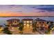 Waterfront homes with lush landscaping, private docks and beautiful sunset views, ideal for luxury living at 16365 Redington Dr, Redington Beach, FL 33708