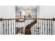Open foyer with staircase, lighting, and great views of the home's interior at 16365 Redington Dr, Redington Beach, FL 33708