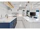 Luxury kitchen with double islands, marble countertops, and custom cabinetry at 16365 Redington Dr, Redington Beach, FL 33708
