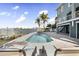 Gorgeous waterfront pool and patio area, perfect for relaxation and enjoying the waterfront views at 16365 Redington Dr, Redington Beach, FL 33708