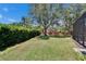 A well maintained lawn, hedges, and fence at 16367 Ashington Park Dr, Tampa, FL 33647
