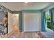 ' bedroom with a closet, view to the ensuite bathroom, and a large window at 16367 Ashington Park Dr, Tampa, FL 33647