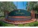 Community sign surrounded by well-maintained landscaping creating an inviting entrance at 16367 Ashington Park Dr, Tampa, FL 33647