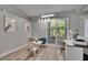Versatile sitting room or office space featuring bright natural light and neutral decor at 16367 Ashington Park Dr, Tampa, FL 33647