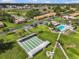 Community featuring shuffleboard courts, a pool, and convenient parking at 1701 Pinehurst Rd # 9G, Dunedin, FL 34698