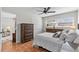 Bright bedroom with natural light, a ceiling fan, and ample closet space at 1701 Pinehurst Rd # 9G, Dunedin, FL 34698