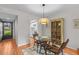 Cozy dining room featuring a modern pendant light and stylish décor at 1701 Pinehurst Rd # 9G, Dunedin, FL 34698
