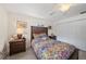 Lovely bedroom with tile floors, closet and traditional furnishings at 1707 Hibiscus S Cir, Oldsmar, FL 34677