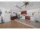 Garage with laundry area, water heater, and cabinet space for extra storage at 1707 Hibiscus S Cir, Oldsmar, FL 34677