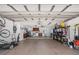 Spacious two-car garage features high ceilings, ample storage, and convenient laundry area at 1707 Hibiscus S Cir, Oldsmar, FL 34677