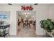 Open-concept floor plan with tile flooring, dining area, and comfortable living room at 1707 Hibiscus S Cir, Oldsmar, FL 34677