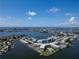 An aerial view of the community including waterfront access, parking, and beautifully landscaped grounds at 1859 Shore S Dr # 202, South Pasadena, FL 33707