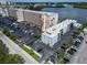 Community aerial view shows well-kept building exterior, and nearby parking at 1859 Shore S Dr # 202, South Pasadena, FL 33707