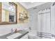 Bathroom with modern sink, toilet, and shower at 1859 Shore S Dr # 202, South Pasadena, FL 33707
