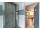 An elevator in a building with painted brick walls offers easy access at 1859 Shore S Dr # 202, South Pasadena, FL 33707