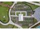 Aerial view of community gardens offering residents a serene green space to grow their own plants and connect with nature at 19183 Coastal Shore Ter, Land O Lakes, FL 34638