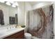 Updated bathroom with a shower/tub combination and stylish vanity at 19183 Coastal Shore Ter, Land O Lakes, FL 34638