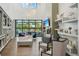 Stylish clubhouse featuring comfortable seating, elegant decor, and bright, open spaces at 19183 Coastal Shore Ter, Land O Lakes, FL 34638