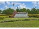 Landscaped sign for 'The Meridian at Bexley' community at 19183 Coastal Shore Ter, Land O Lakes, FL 34638