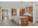 Well-equipped kitchen with a large island, stainless steel appliances, and modern finishes at 19183 Coastal Shore Ter, Land O Lakes, FL 34638