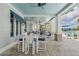 Charming patio with outdoor seating, ideal for dining and relaxation at 19183 Coastal Shore Ter, Land O Lakes, FL 34638