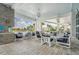 Inviting patio with ample seating, providing a comfortable outdoor space for residents at 19183 Coastal Shore Ter, Land O Lakes, FL 34638