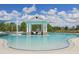 Beautiful swimming pool with a covered gazebo, creating a perfect spot for relaxation at 19183 Coastal Shore Ter, Land O Lakes, FL 34638