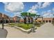 Inviting outdoor shopping center featuring green spaces, seating areas, and a variety of shops and restaurants at 19183 Coastal Shore Ter, Land O Lakes, FL 34638