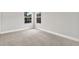 Bedroom featuring neutral walls, carpet, and a window with natural light at 20106 Bending Creek Pl, Tampa, FL 33647
