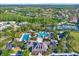An aerial shot of the community amenities including a pool, clubhouse, and tennis courts at 20106 Bending Creek Pl, Tampa, FL 33647
