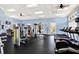 Bright community gym with treadmills, weights, machines, and ample space for a comprehensive workout at 20106 Bending Creek Pl, Tampa, FL 33647