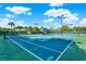 Well-maintained tennis courts with lush landscaping, providing a perfect space for recreational play and exercise at 20106 Bending Creek Pl, Tampa, FL 33647
