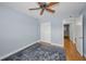Bedroom with a closet has wood flooring at 2073 Denmark St # 9, Clearwater, FL 33763