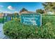 Well-maintained community dog park with green space and clear signage for pet owners at 2073 Denmark St # 9, Clearwater, FL 33763