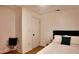 Cozy bedroom showcasing a neutral color palette and a minimalist design at 2219 Thrace St, Tampa, FL 33605