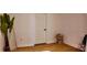 Airy bedroom featuring natural light, a neutral color palette, and wood flooring at 2219 Thrace St, Tampa, FL 33605
