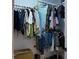 Well-organized walk-in closet featuring gold shelving and ample storage space at 2219 Thrace St, Tampa, FL 33605