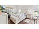 Comfortable bedroom with wood floors, neutral tones, and ample natural light at 22852 Fern Ct, Land O Lakes, FL 34639