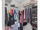 Walk-in closet with shelving racks and storage for clothing and shoes at 22852 Fern Ct, Land O Lakes, FL 34639